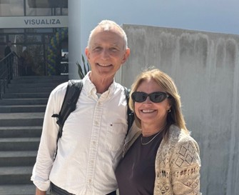 A photo with Optometry Giving Sight Executive Director, Donna Mikulecky, with Dr. Doug Villella, Vision for the Poor Executive Director